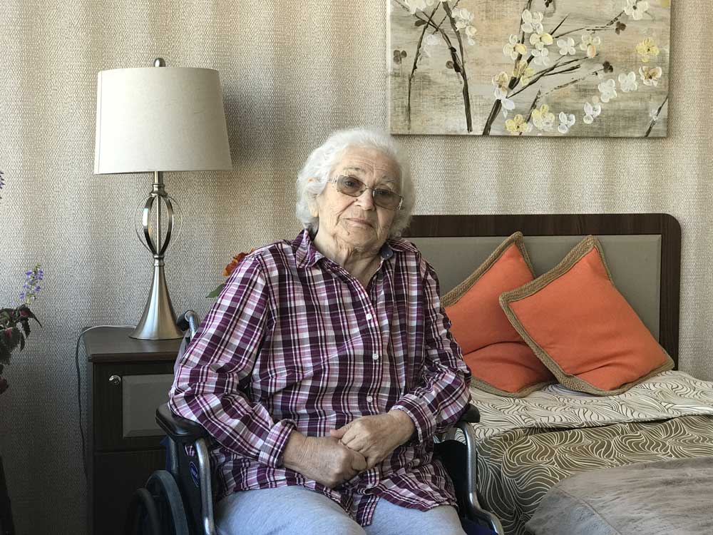 Senior women on wheelchair getting a hip replacement rehab