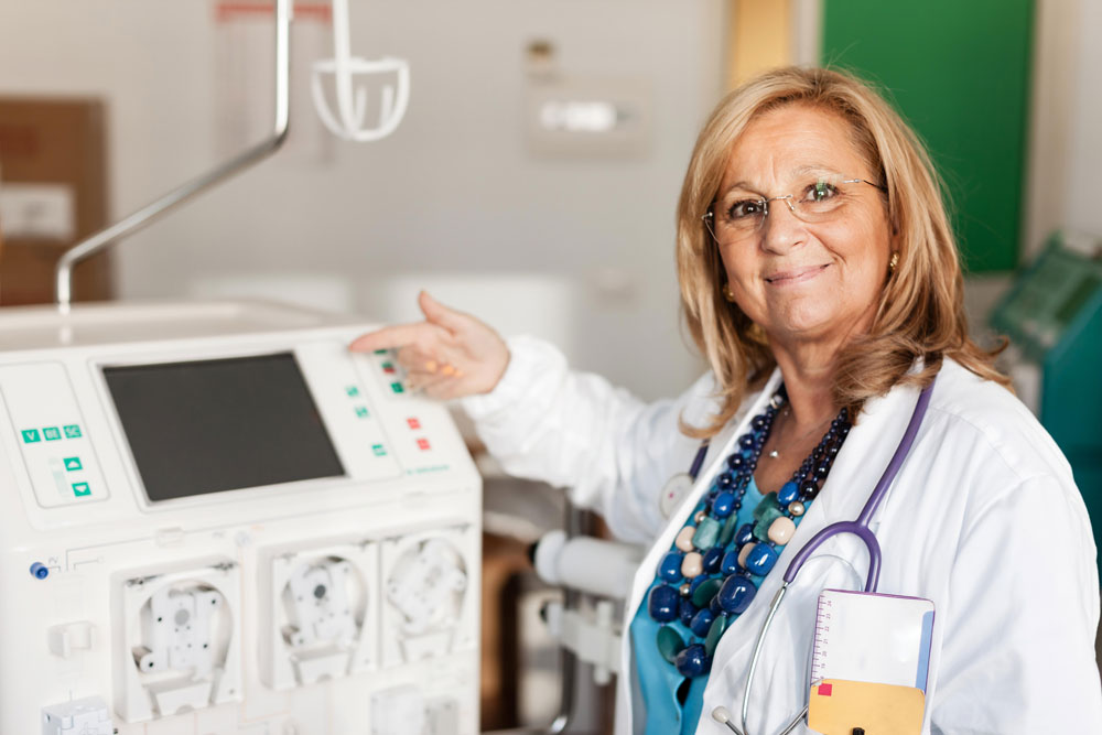 Dialysis Therapy Doctor showing a dialyser used to do dialysis therapy