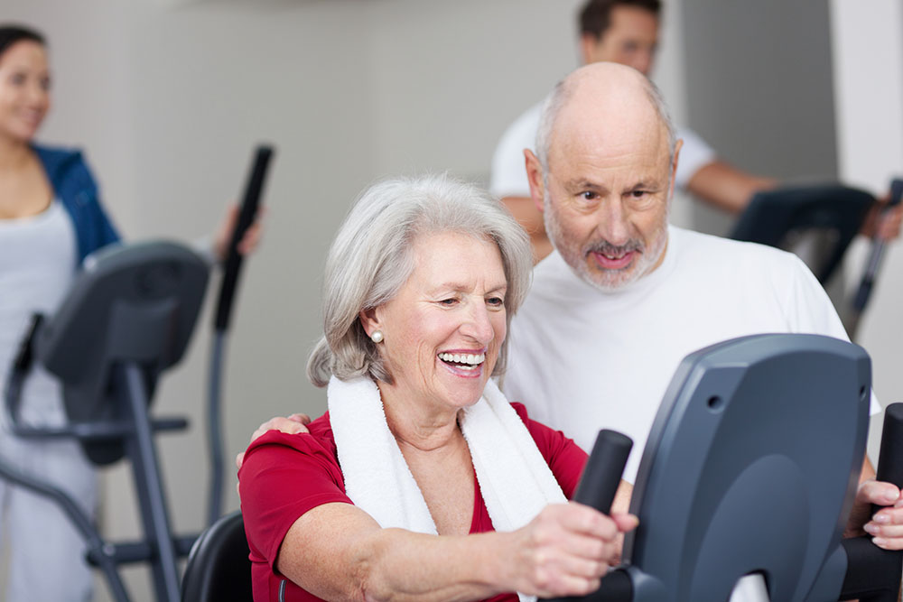 Elderly woman doing cardio as a part of cardiopulmonary rehabilitation